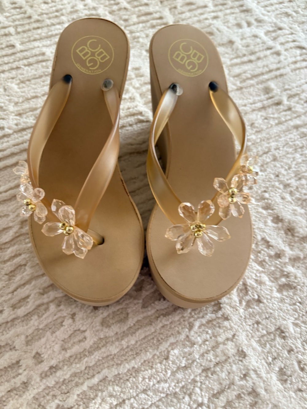 BCBG Tan Platform Flip Flop Sandals with Clear Floral Embellishments